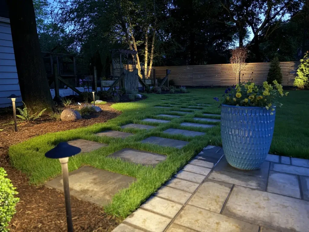 Modern backyard garden lighting at dusk